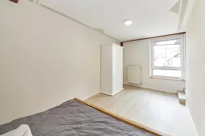 Ein Bett oder Betten in einem Zimmer der Unterkunft Haus am Hafen