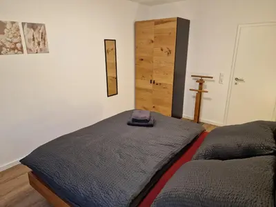 Ein Bett oder Betten in einem Zimmer der Unterkunft Ferienwohnungen Lenz