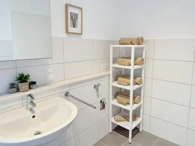 Ein Badezimmer in der Unterkunft Deichstadt Apartments