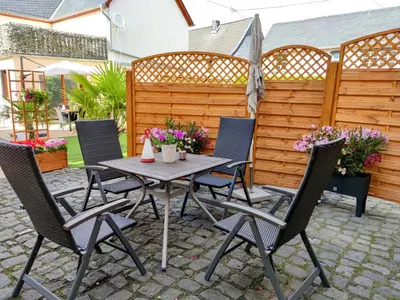 Ein Patio oder anderer Außenbereich in der Unterkunft Maifeld-Fewo Rhapsodie