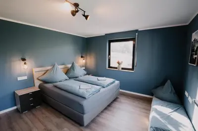Ein Bett oder Betten in einem Zimmer der Unterkunft Ruhiges Soonwald Cottage