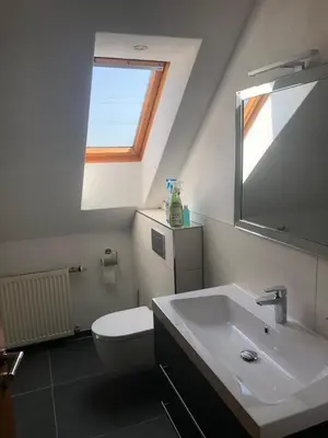 Ein Badezimmer in der Unterkunft Ferienwohnung auf dem Maifeld