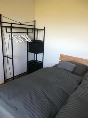 Ein Bett oder Betten in einem Zimmer der Unterkunft Ferienwohnung auf dem Maifeld
