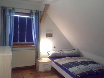Ein Bett oder Betten in einem Zimmer der Unterkunft Ferienwohnung Stablo