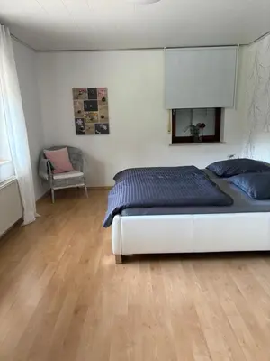 Ein Bett oder Betten in einem Zimmer der Unterkunft Ferienwohnung Wahlich