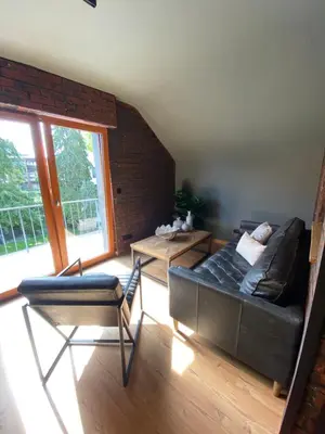 Ein Sitzbereich in der Unterkunft Megina Lodge