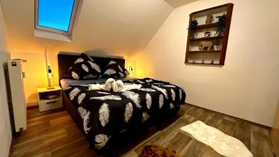 Ein Bett oder Betten in einem Zimmer der Unterkunft Moderne Zentrale FeWo City Retreat