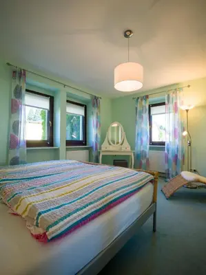Ein Bett oder Betten in einem Zimmer der Unterkunft Ferienhaus an der Austwies