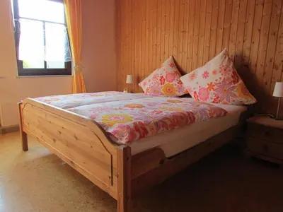 Ein Bett oder Betten in einem Zimmer der Unterkunft Ferienhaus an der Austwies