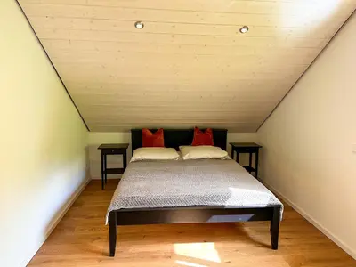 Ein Bett oder Betten in einem Zimmer der Unterkunft Traumferienhaus Leimbach am Nürburgring