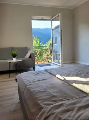 Ein Bett oder Betten in einem Zimmer der Unterkunft Willi's Moselschlösschen