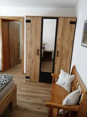 Ein Bett oder Betten in einem Zimmer der Unterkunft Eifelferienwohnungen 