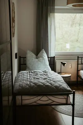 Ein Bett oder Betten in einem Zimmer der Unterkunft Ferienwohnung „Göttschied“