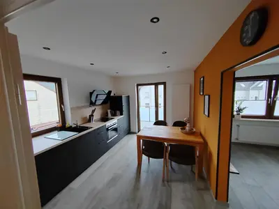 Ein Bett oder Betten in einem Zimmer der Unterkunft Ferienweingut Kappes