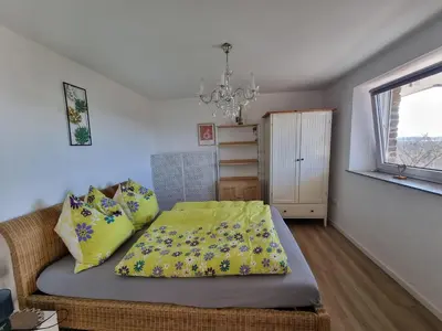 Ein Bett oder Betten in einem Zimmer der Unterkunft Manderscheid Ferienwohnung mit Weitblick