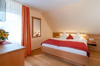 Ein Bett oder Betten in einem Zimmer der Unterkunft Ferienwohnungen Engelmannstift