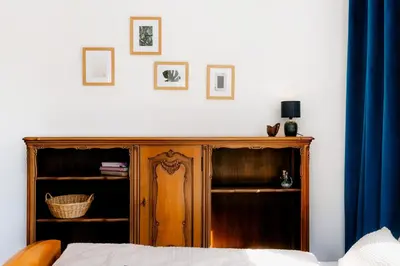 Ein Bett oder Betten in einem Zimmer der Unterkunft Grüne Wohnoase - stilvoll - Balkonidylle - Zentrum
