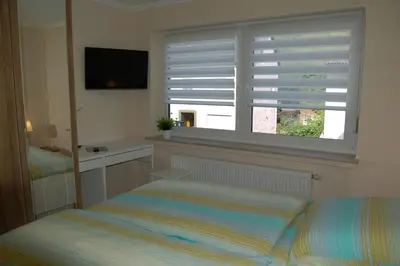 Ein Bett oder Betten in einem Zimmer der Unterkunft Ferienhaus Mosel Bub
