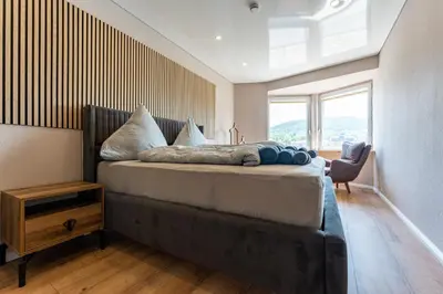 Ein Bett oder Betten in einem Zimmer der Unterkunft Moselresidenz Bellevue Alf