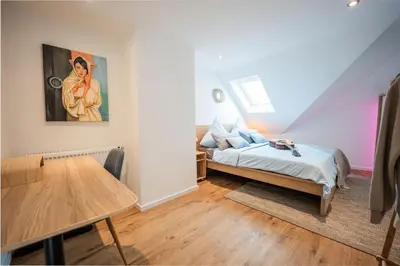 Ein Bett oder Betten in einem Zimmer der Unterkunft A Hidden Gem in the Heart of Koblenz