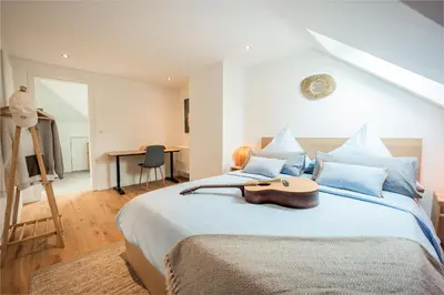Ein Bett oder Betten in einem Zimmer der Unterkunft A Hidden Gem in the Heart of Koblenz