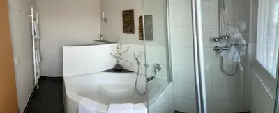Ein Badezimmer in der Unterkunft Traumhaus am Maar 3