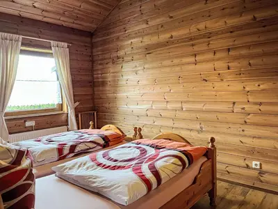 Ein Bett oder Betten in einem Zimmer der Unterkunft Holiday Home Schöne Aussicht by Interhome