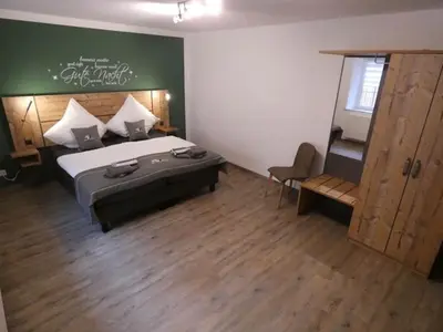 Ein Bett oder Betten in einem Zimmer der Unterkunft Neuendorf Hillside Haven