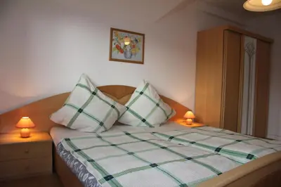Ein Bett oder Betten in einem Zimmer der Unterkunft Apartment Sonnenschein