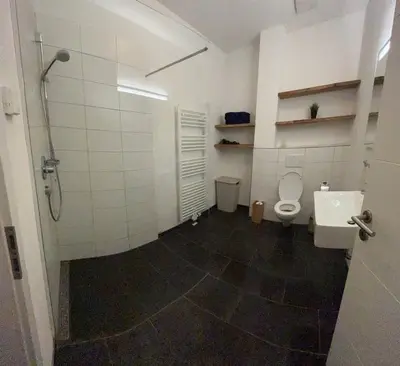 Ein Badezimmer in der Unterkunft Trier City Center Apartments Altstadt