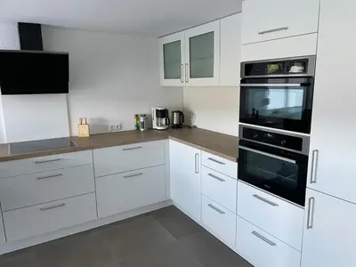Küche/Küchenzeile in der Unterkunft Ferienapartment Auszeit- Sauna, Whirlpool und Garten zur Alleinnutzung