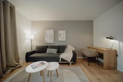 Ein Sitzbereich in der Unterkunft Coblenz Suites - Design Apartment City