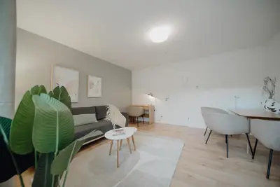 Ein Sitzbereich in der Unterkunft Coblenz Suites - Design Apartment City