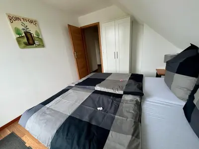 Ein Bett oder Betten in einem Zimmer der Unterkunft Charmantes Ferienhaus an der Mosel