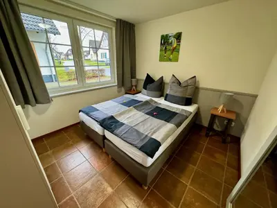 Ein Bett oder Betten in einem Zimmer der Unterkunft Charmantes Ferienhaus an der Mosel