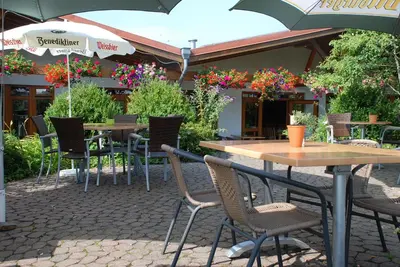 Ein Garten an der Unterkunft Ferienwohnungen Landgasthaus Janshen
