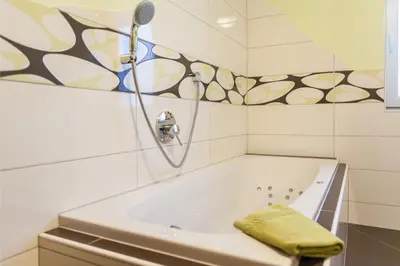 Ein Badezimmer in der Unterkunft Ferienwohnungen Landgasthaus Janshen