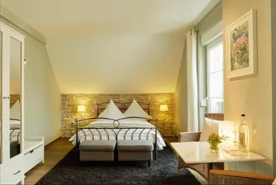Ein Bett oder Betten in einem Zimmer der Unterkunft Landhauskiebel