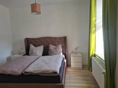Ein Bett oder Betten in einem Zimmer der Unterkunft Ferienwohnung am Nationalpark Hunsrück Hochwald