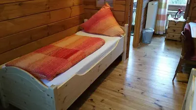 Ein Bett oder Betten in einem Zimmer der Unterkunft Haus Rheinsteig bei Koblenz