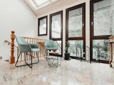 Ein Sitzbereich in der Unterkunft Ferienapartment Am Gaulsbach