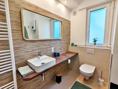 Ein Badezimmer in der Unterkunft Apartmenthaus GOLDGRUBE
