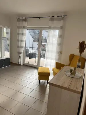 Ein Sitzbereich in der Unterkunft Sunset Apartment mit Rheinblick in Urbar
