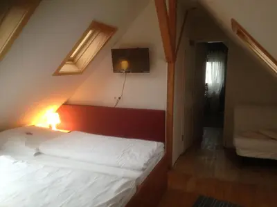 Ein Bett oder Betten in einem Zimmer der Unterkunft Landhaus Balkhausen