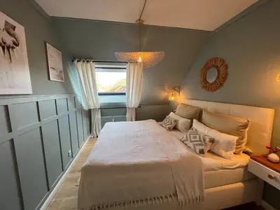 Ein Bett oder Betten in einem Zimmer der Unterkunft Estelle