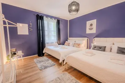 Ein Bett oder Betten in einem Zimmer der Unterkunft Rheinsteig Chalét Bendorf