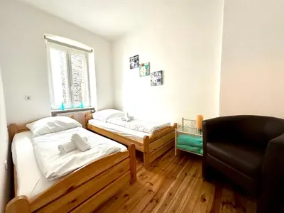 Ein Bett oder Betten in einem Zimmer der Unterkunft Ferienwohnungen-Traben-Trarbach
