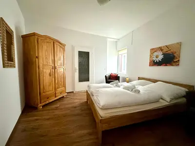 Ein Bett oder Betten in einem Zimmer der Unterkunft Ferienwohnungen-Traben-Trarbach
