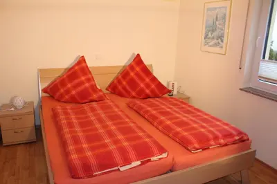 Ein Bett oder Betten in einem Zimmer der Unterkunft Ferienhaus Willwert