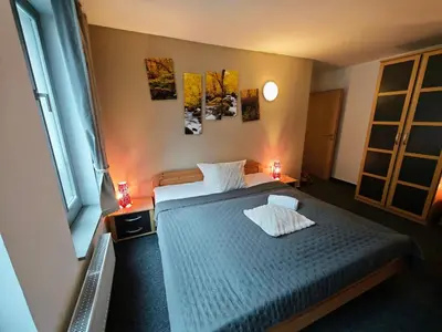 Ein Bett oder Betten in einem Zimmer der Unterkunft Bacchus Holiday Homes